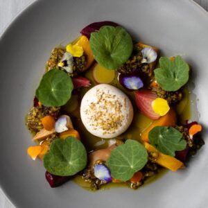 Diverse plant-based plate with legumes and grains aligned with the 2026 Global Pulse trend